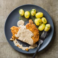 Pan-Fried Pork Chops with Milk Gravy | Cook's Country image