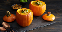 Pumpkin Soup in Mini Pumpkin Bowls - PureWow image