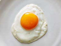 Pristine Sunny-Side Up Eggs Recipe | Cooking Light image