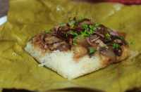 Steamed Sticky Rice and Pork Wrapped in Banana Leaves image
