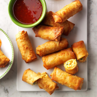 Air-Fryer Crispy Sriracha Spring Rolls Recipe: How to Make It - Taste of Home: Find Recipes, Appetizers, Desserts, Holiday Recipes & Healthy ... image