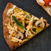 Mushroom, Squash, & Smoked Gouda Pizza Recipe | MyRecipes image