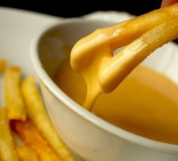 Cheesy Chips - Recipes and cooking tips - BBC Good Food image