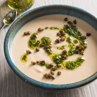 Creamy White Bean Soup with Herb Oil and Crispy Capers ... image