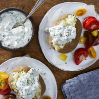 Sour Cream-&-Herb Baked Potatoes Recipe | EatingWell image