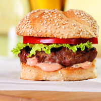 Classic Hamburger Recipe | EatingWell image