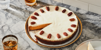 Pumpkin Cheesecake with Bourbon Sour Cream Topping Recipe ... image
