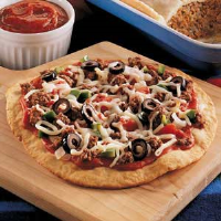 Personal Pizza Recipe: How to Make It - Taste of Home image