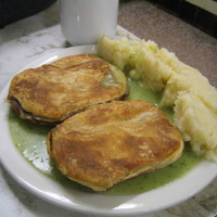 Traditional pie 'n' mash with parsley liquor image