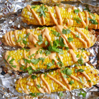 Foil-Packet Corn with Sriracha-Mayo Drizzle Recipe ... image