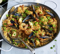 Seafood paella recipe | BBC Good Food image