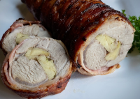 Bacon-Wrapped Pork Tenderloin with Apple Stuffing | Allrecipes image
