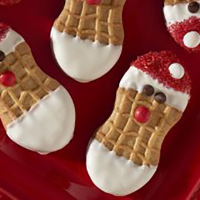 NUTTER BUTTER Santas [Ad] Recipe | MyRecipes image