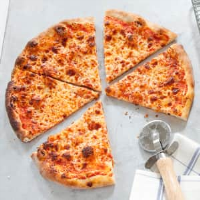 Thin-Crust Pizza | America's Test Kitchen image