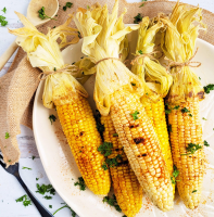 Spicy Grilled Corn on the Cob Recipe | EatingWell image