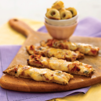 Pizza Sticks Recipe | MyRecipes image