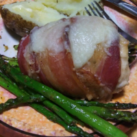Bacon-Wrapped Chicken Thighs Smothered and Stuffed with ... image