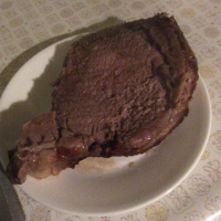 Herbed Prime Rib Roast with Red Wine Sauce | Allrecipes image