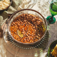 Black-Eyed Peas with Slab Bacon Recipe | EatingWell image
