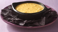 Bubbling Cauldron Cheese Dip with Bat Wing Dippers Recipe ... image