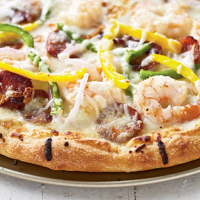 Mardi Gras Pizza Recipe | MyRecipes image