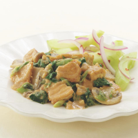 Tofu with Peanut-Ginger Sauce Recipe | EatingWell image