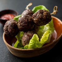Asian Beef Meatballs Recipe | EatingWell image