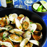 Red Curry Clams Recipe | EatingWell image