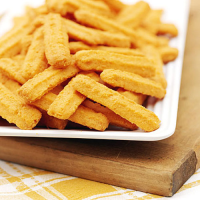 Spicy Cheese Straws Recipe | Southern Living image
