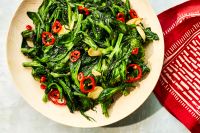 Stir-Fried Garlicky Snow Pea Shoots Recipe | Food & Wine image