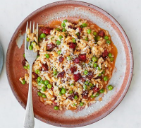 Chorizo & pea risotto recipe | BBC Good Food image