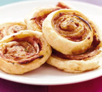 Pizza puff pinwheels recipe | BBC Good Food image