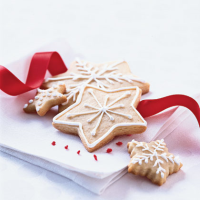 Christmas Sugar Wafers with Vanilla Icing Recipe | MyRecipes image