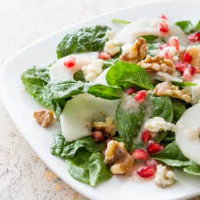 Spinach Salad with Gorgonzola and Pear | Cook's Country image
