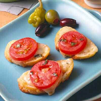 Tomato Cheese Baguettes Recipe | Land O’Lakes image
