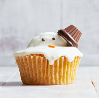 Melty Snowman Cupcake | Better Homes & Gardens image