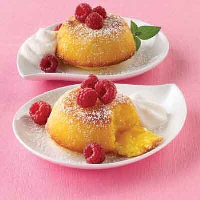 Lemon Molten Cake with Raspberries Recipe | Land O’Lakes image