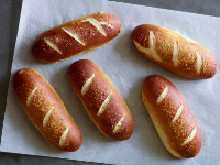 Pretzel Hot Dog Buns Recipe | Jeff Mauro | Food Network image