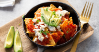 Vegan Chilaquiles with Red Sauce Recipe - PureWow image