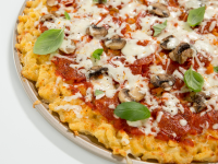 Mac and Cheese Crusted Pizza Recipe | MyRecipes image