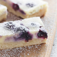 Blueberry Swirl Cheesecake Bars | Better Homes & Gardens image