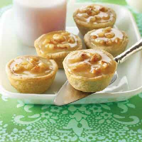 Cardamom Honey Tartlets Recipe | Land O’Lakes image