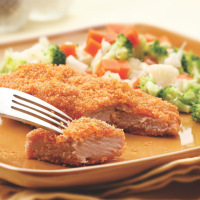 Golden Baked Pork Cutlets Recipe | EatingWell image