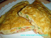Tomato and cheese omelette - Recipe Petitchef image