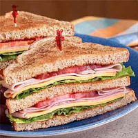 All-American Deli Club Sandwich Recipe | Land O’Lakes image