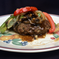 Hamburger Steaks with Peppers, Onions, and Mushrooms ... image