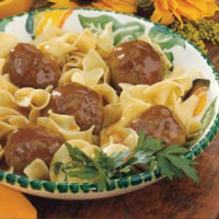 Tangy Meatballs Over Noodles Recipe: How to Make It image