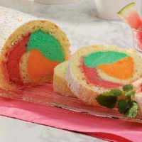 Rainbow Cake Roll Recipe: How to Make It - Taste of Home image