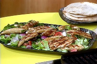 Greek Grilled Chicken and Vegetable Salad with Warm Pita ... image