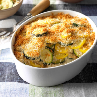 Yellow Squash and Zucchini Gratin Recipe: How to Make It - Taste of Home: Find Recipes, Appetizers, Desserts, Holiday Recipes & Healthy Cooking Tips image